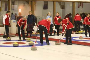 Some action on Sheet 3 as the Canadians attempt to draw the house against the U.S.
